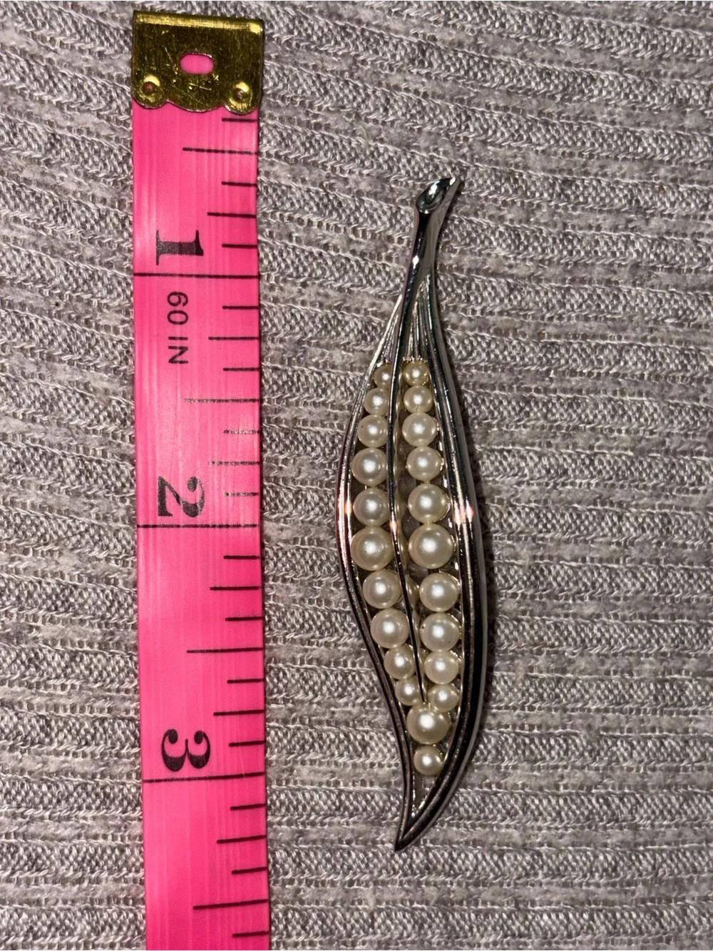 Vintage Trifari signed silver tone wavy faux pearl brooch